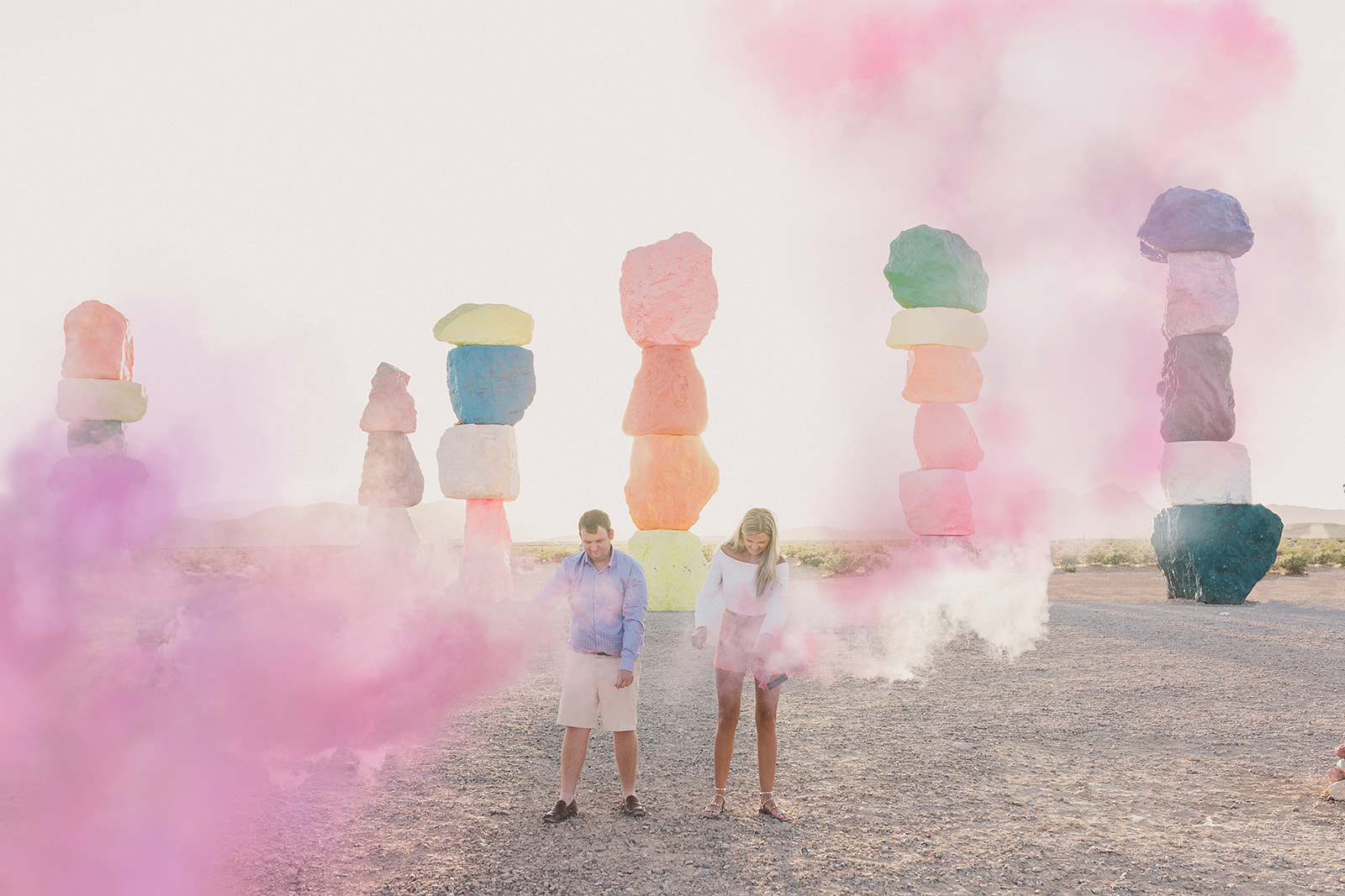 smoke bomb gender reveal for baby girl at Seven Magic Mountains