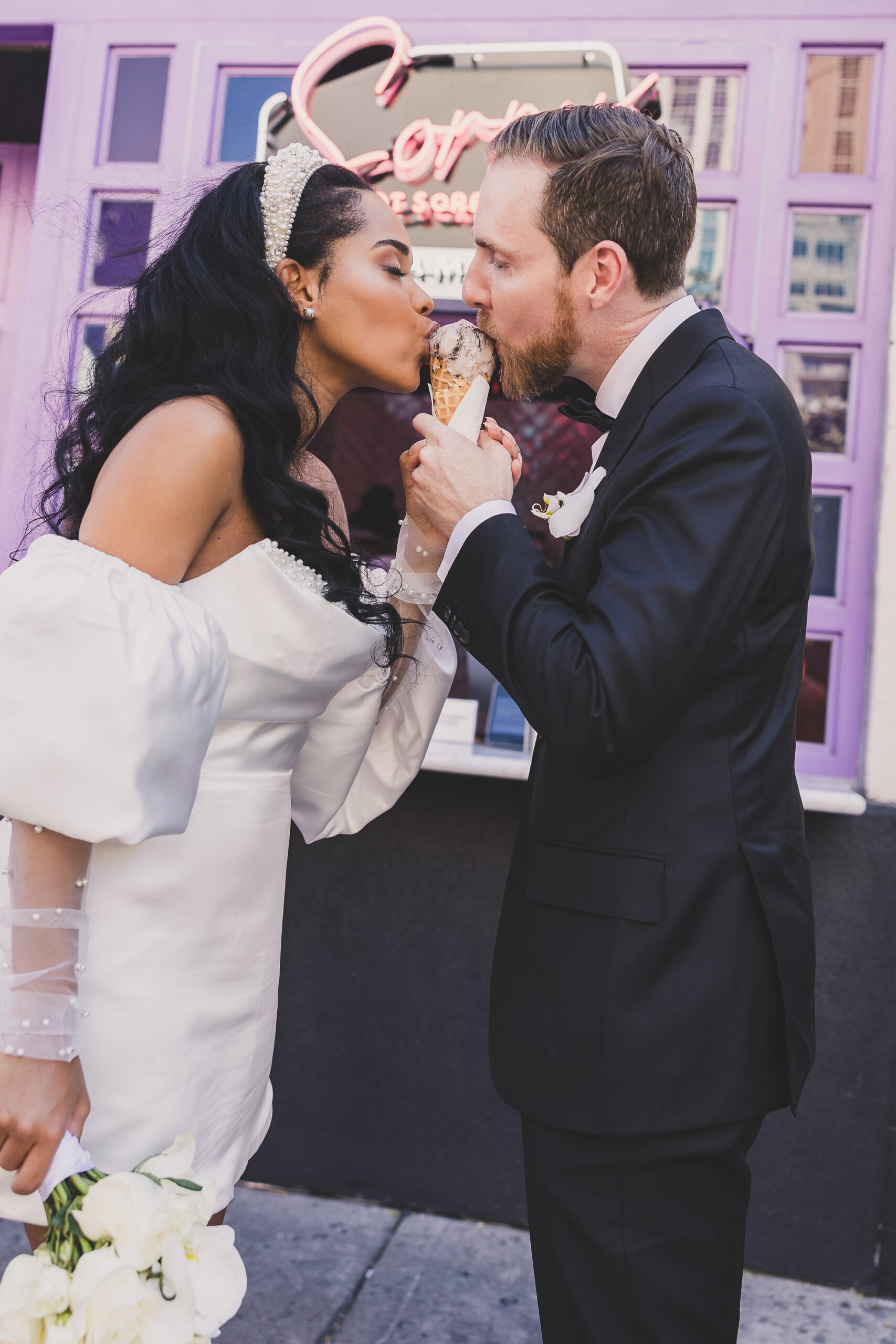 S&C sharing ice cream at Sorry, Not Sorry Creamery during their Las Vegas elopement